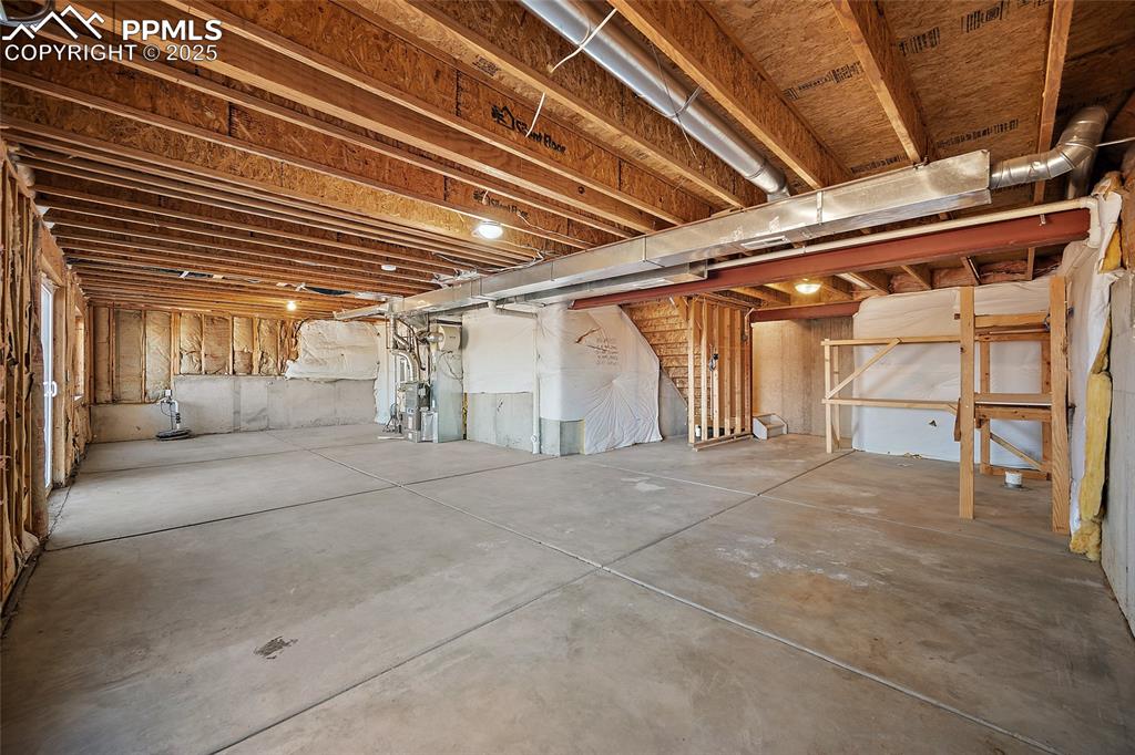 Image 31 of 45: Large, clean unfinished basement