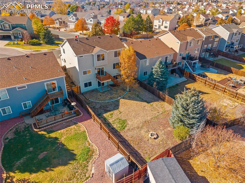 Image 36 of 45: Aerial view of backyard