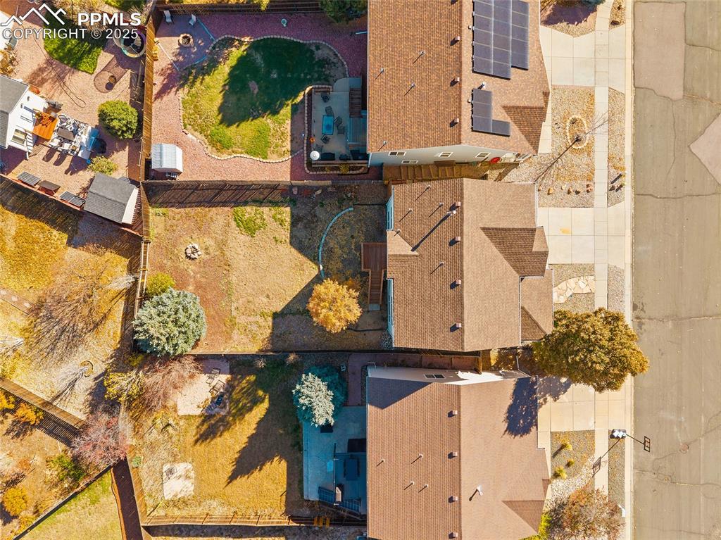 Image 37 of 45: Aerial view of home and large backyard
