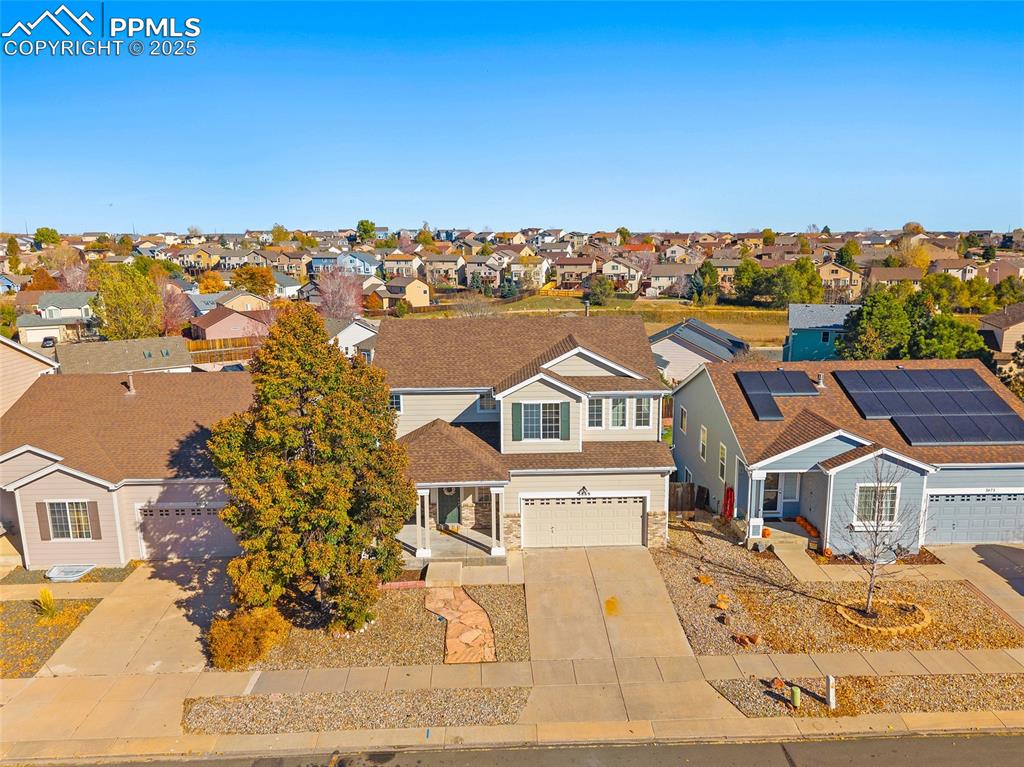 Image 38 of 45: Aerial view of the front of the home