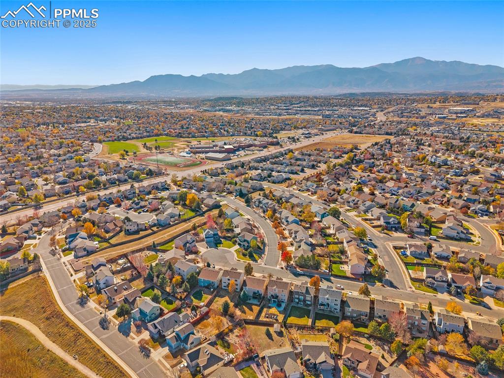 Image 41 of 45: Aerial view of the neighborhood with the gorgeous front range