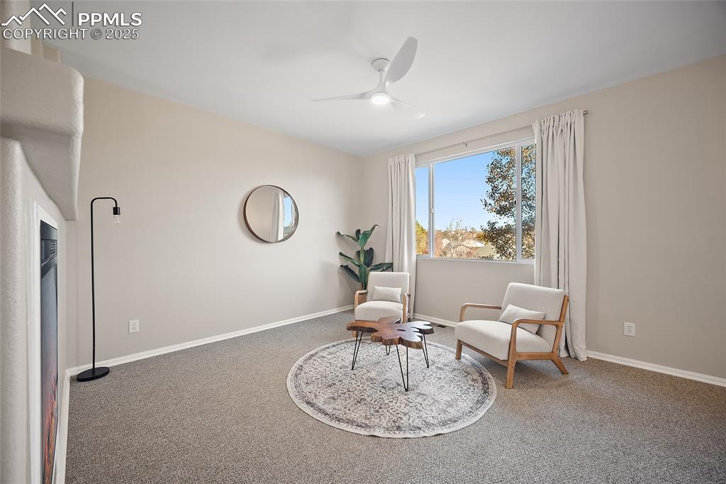 Image 6 of 45: Alternate view of living room with ample natural light