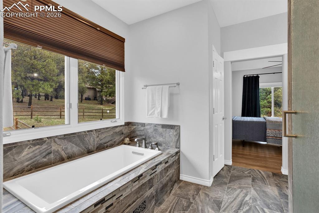 Image 20 of 49: Deep soaking tub