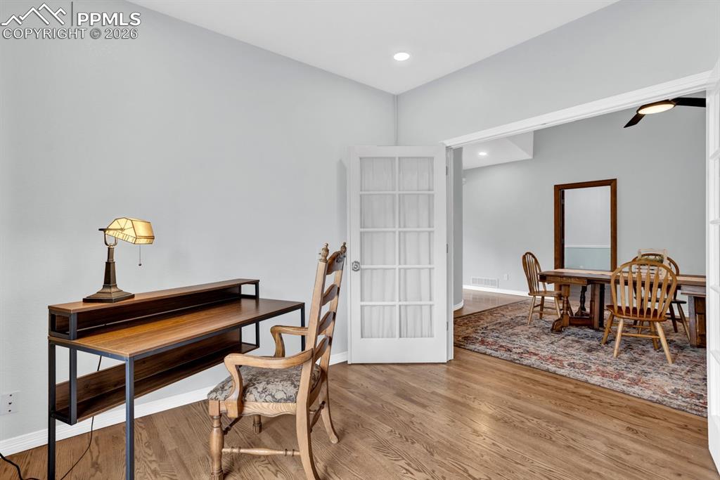 Image 22 of 49: Double glass doors for privacy and glass to let in the light