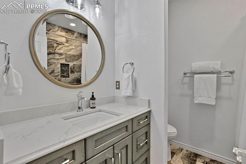 Image 28 of 49: Updated bathroom on main level