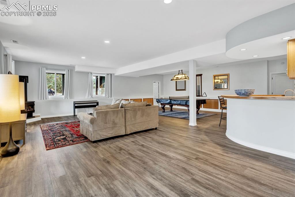 Image 30 of 49: Bright and open Basement recreation area/living room