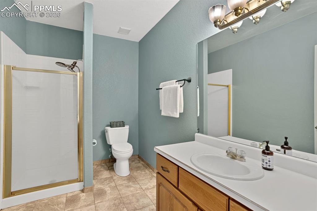 Image 34 of 49: Bathroom with walk-in shower