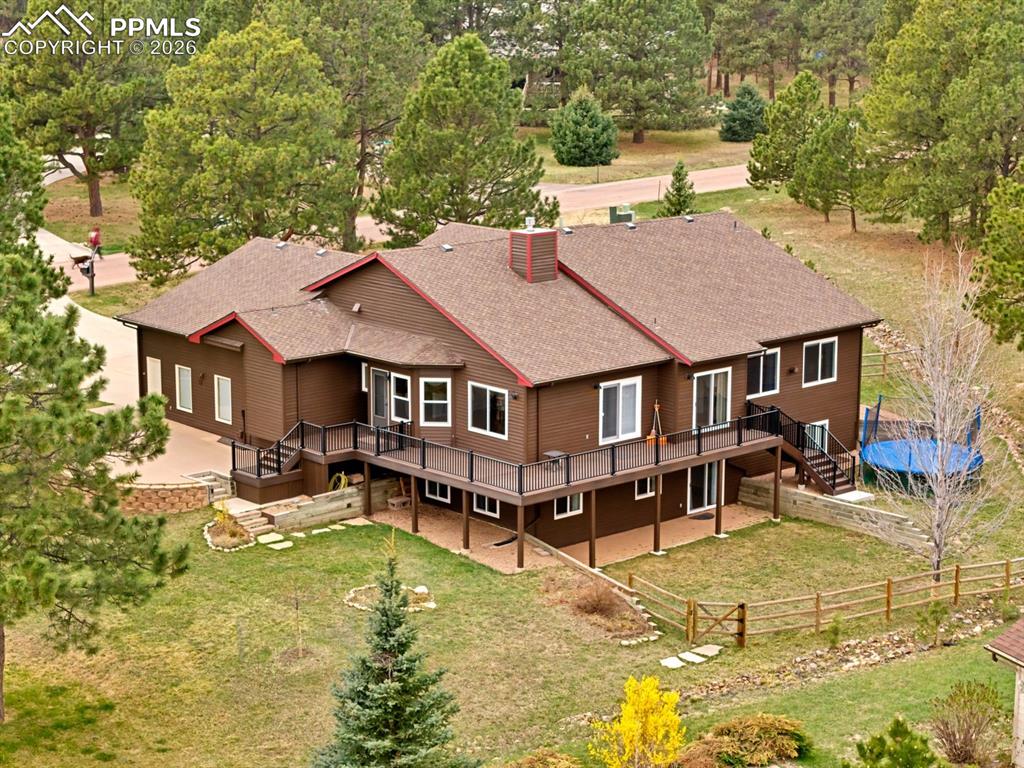 Image 41 of 49: Large wrap around low maintenance deck