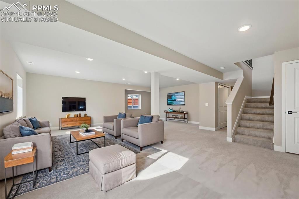 Image 25 of 42: Virtually staged fully finished basement with 2 additional bedrooms and 1 f