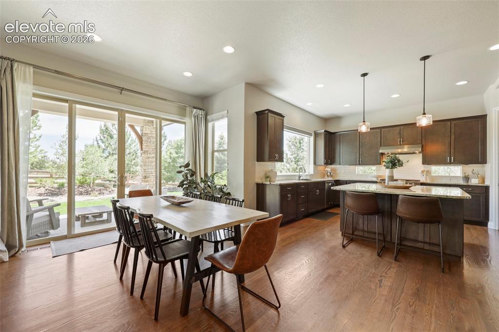 Image 11 of 38: Walk right out to large patio