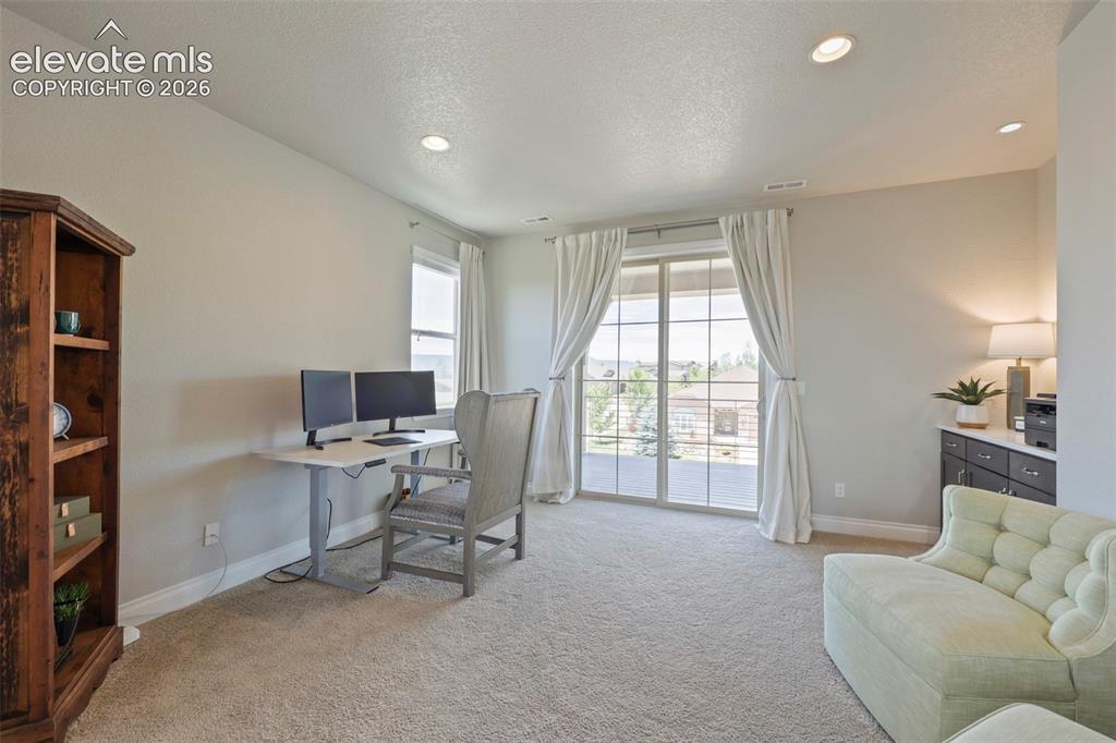 Image 16 of 38: Currently used as an office but could be a nursery area or lounging area wi