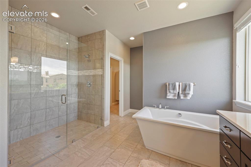 Image 20 of 38: Spa like Master Bath, zero curb into shower