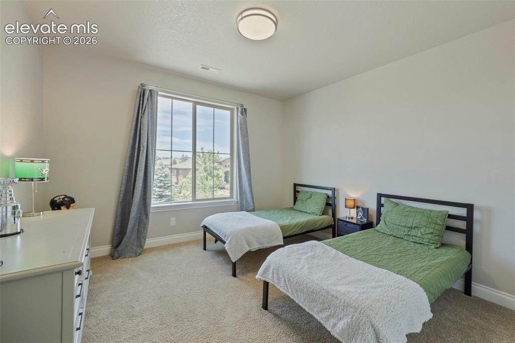 Image 23 of 38: Spacious bedroom upstairs