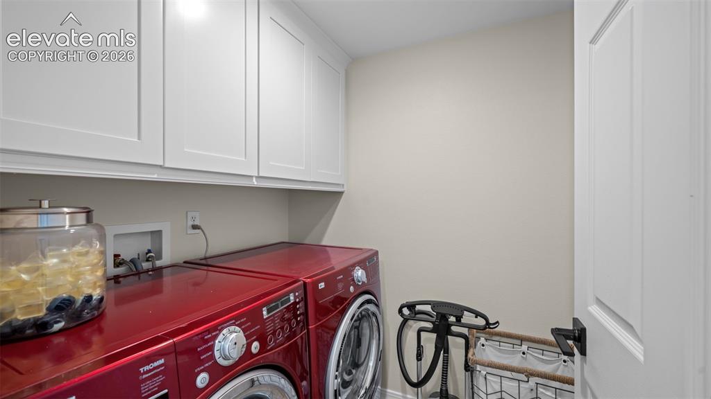Image 11 of 30: Cabinetry for storage
