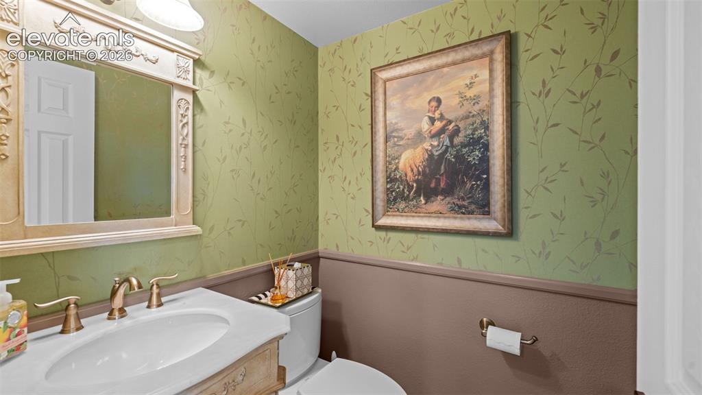 Image 12 of 30: Main level powder room
