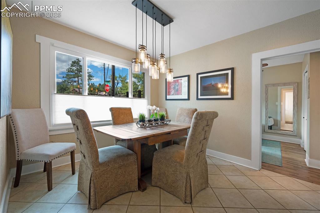 Image 10 of 42: Dining area with Pikes Peak views!