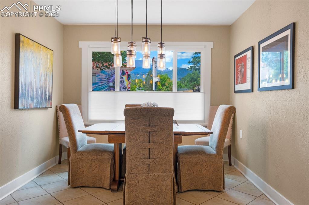 Image 11 of 42: Updated and bright dining area