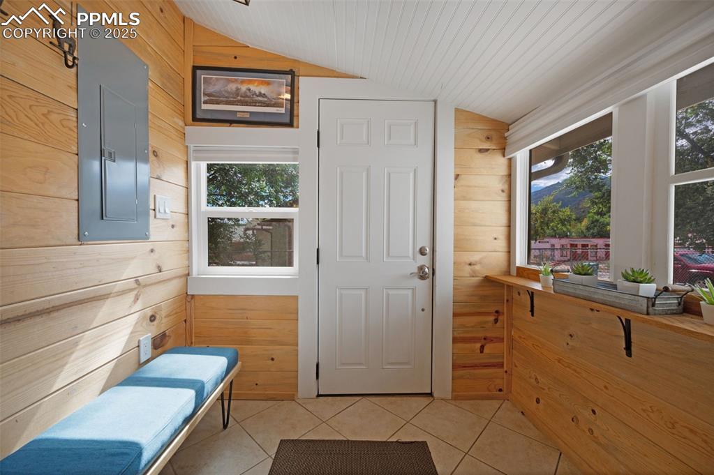 Image 19 of 42: Entry from the back door off the kitchen