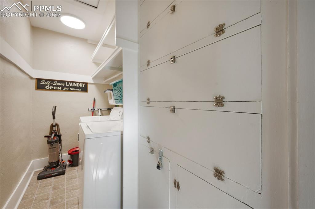 Image 20 of 42: Laundry with storage