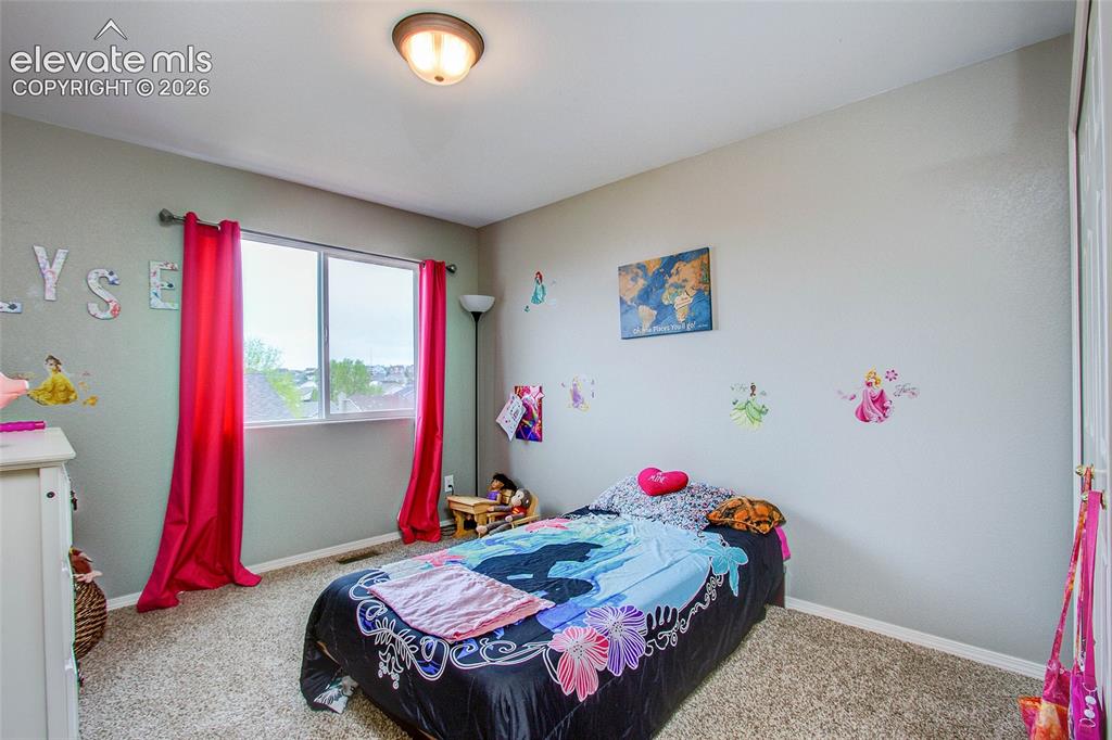 Image 32 of 39: Bedroom