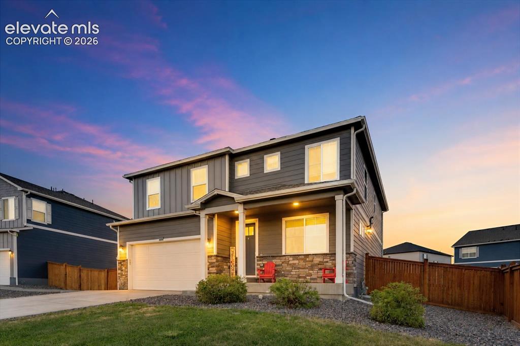 Image 1 of 47: Sunset view of a beautifully designed 5BR, 3BA home that blends smart techn