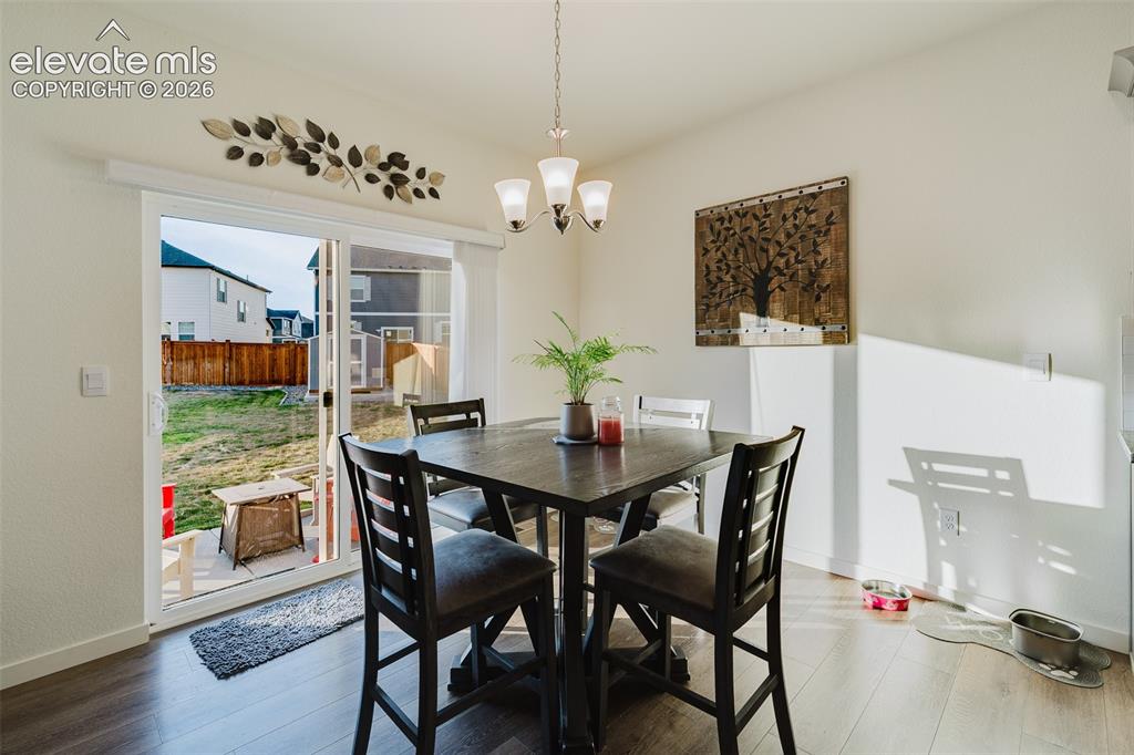 Image 10 of 47: Dining Nook for informal meals with a slider to the backyard patio.