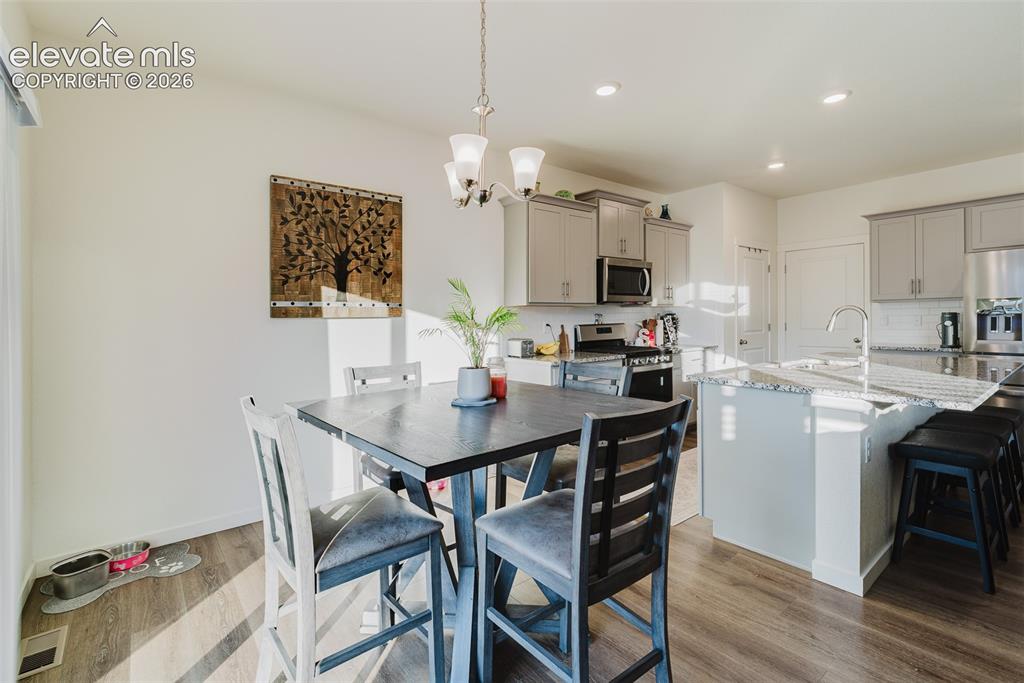 Image 12 of 47: View of the Kitchen from the Dining Nook.