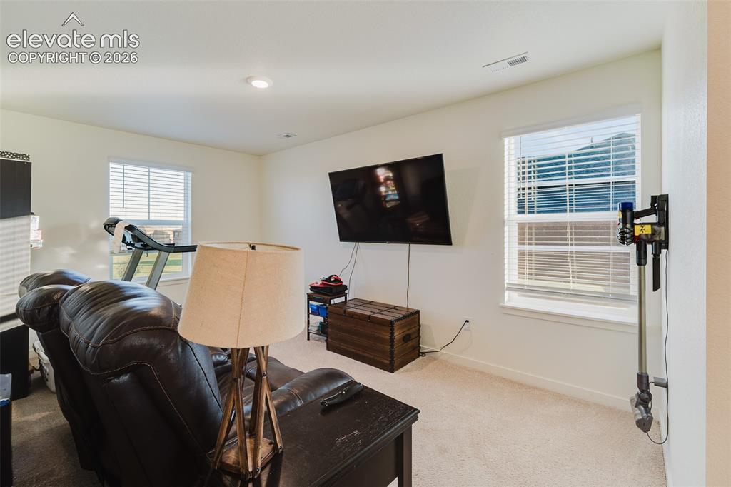 Image 25 of 48: Additional versatile living space in the upper level Loft.