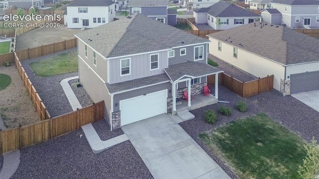 Image 3 of 47: Aerial view of home and lot.