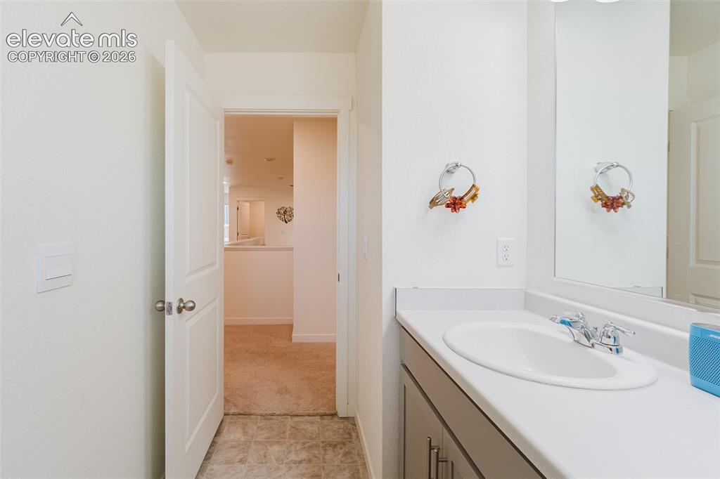 Image 34 of 47: Upper Level Bathroom.