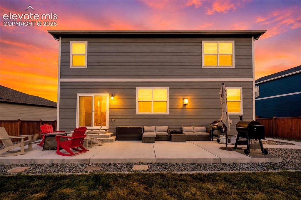 Image 37 of 47: Sunset view of rear patio.