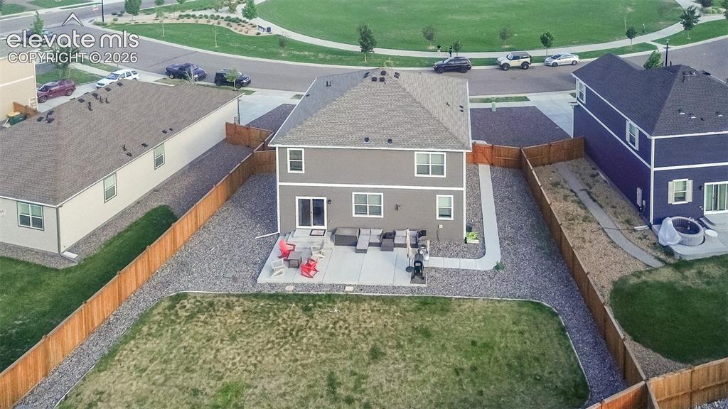 Image 44 of 47: Aerial view of home and backyard.