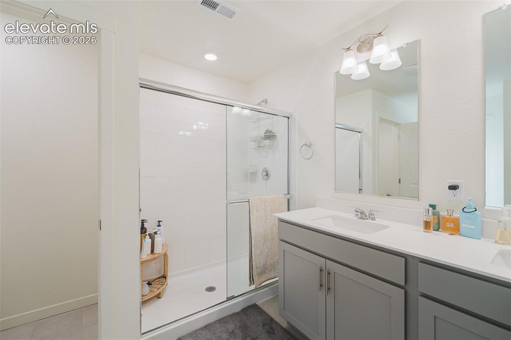 Image 7 of 48: Upper Level Primary Bathroom.