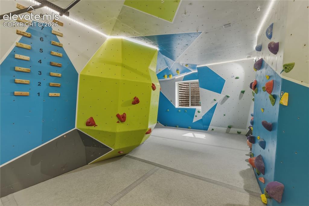 Image 34 of 49: Rock climbing room