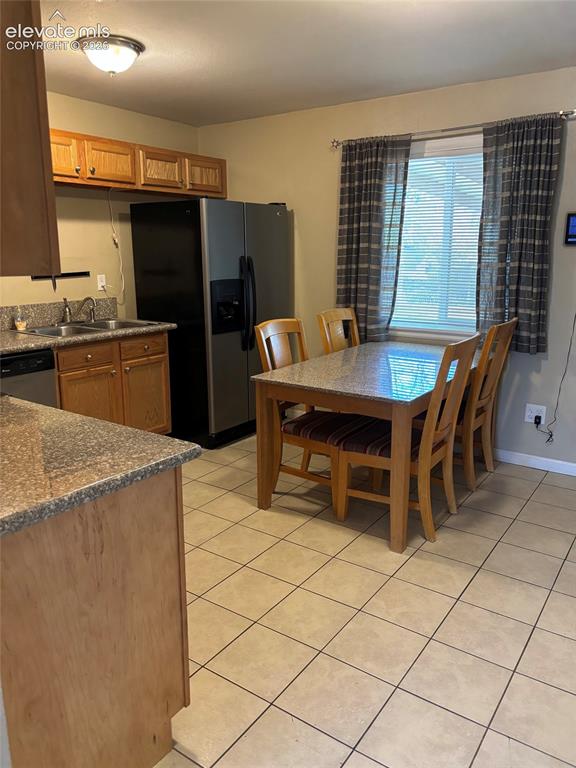 Image 2 of 18: All appliances included, plus a granite topped kitchen table.