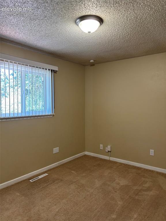 Image 6 of 18: 2nd main level bedroom
