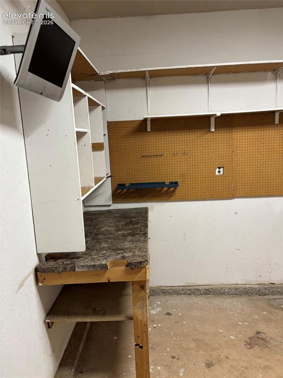 Image 9 of 18: 1 car garage with built in storage and garage door opener