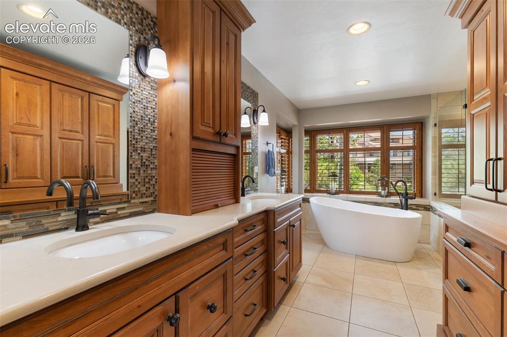 Image 15 of 50: Custom primary 5 piece bathroom