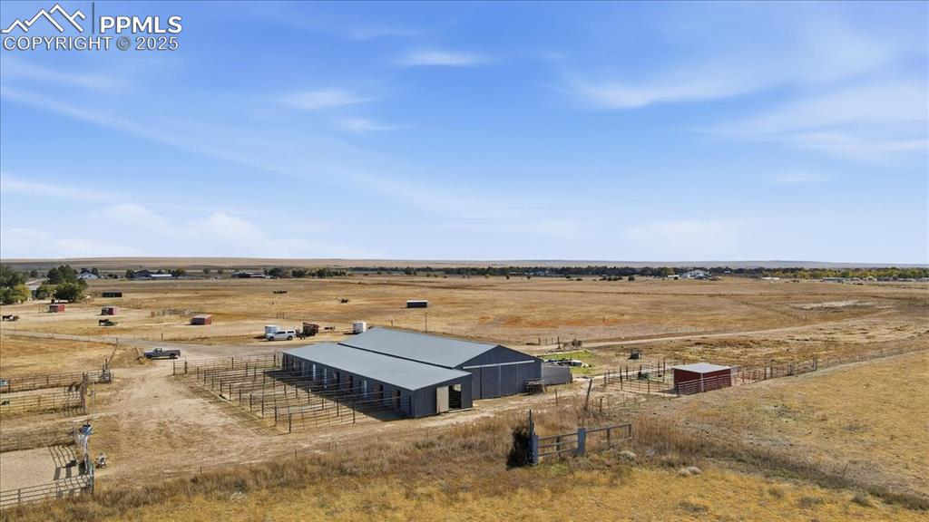 Image 42 of 49: Stall runs from the back arial of the barn