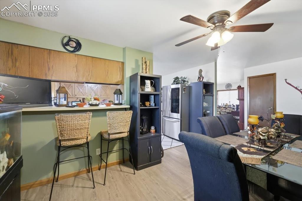 Image 7 of 49: Breakfast bar just off the kitchen