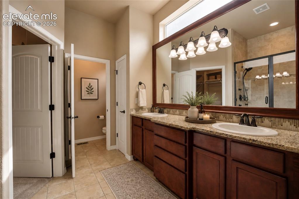 Image 21 of 50: Master Bathroom