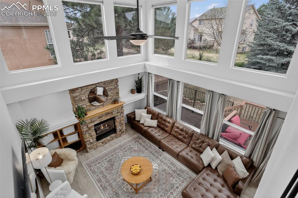 Image 18 of 50: View of family room from upper level hall.