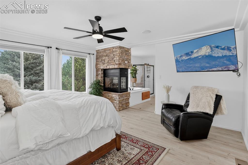 Image 22 of 50: Upper level primary bedroom.