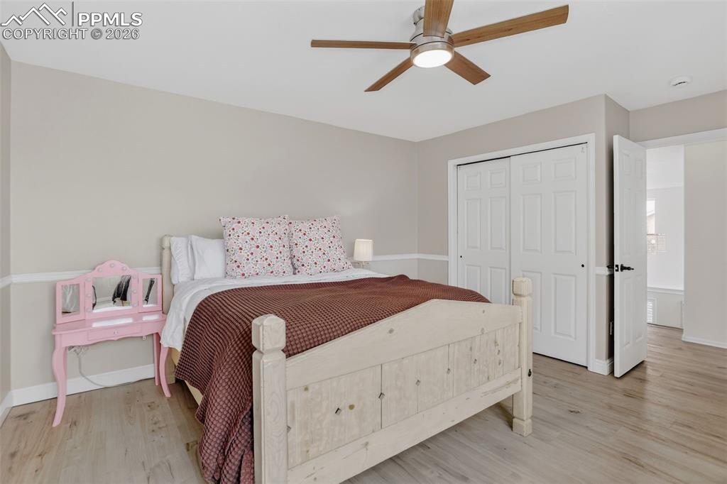 Image 28 of 50: Upper level 2nd bedroom.