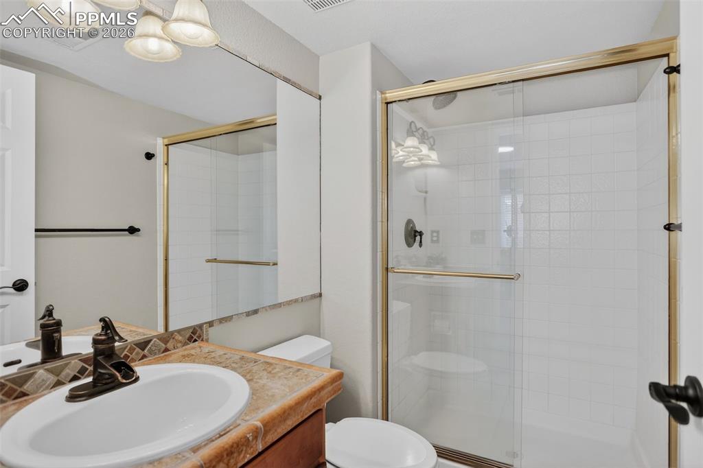 Image 41 of 50: Basement hall bath.