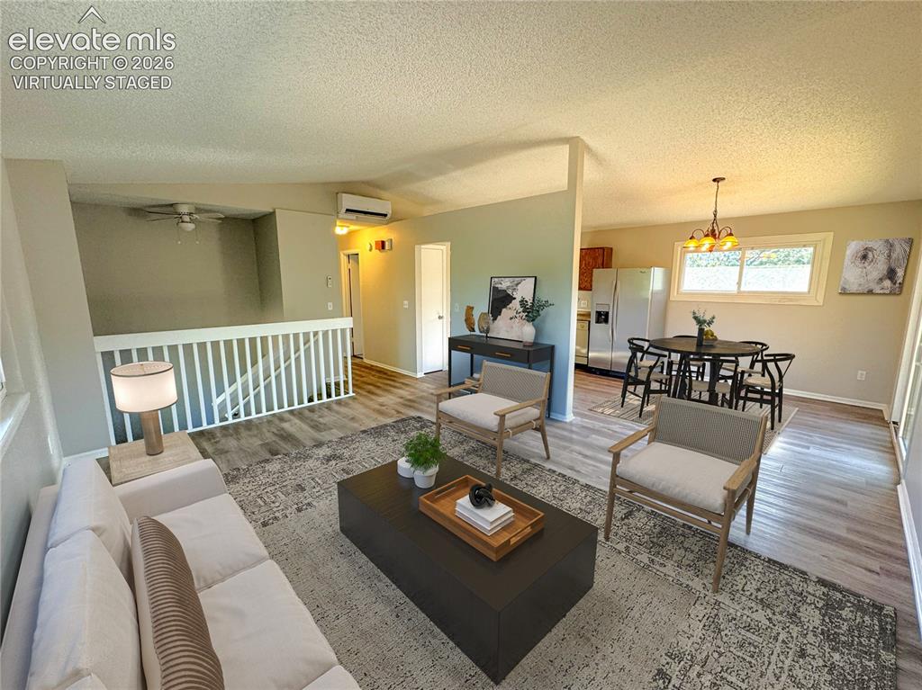 Image 8 of 38: Living room - virtually staged