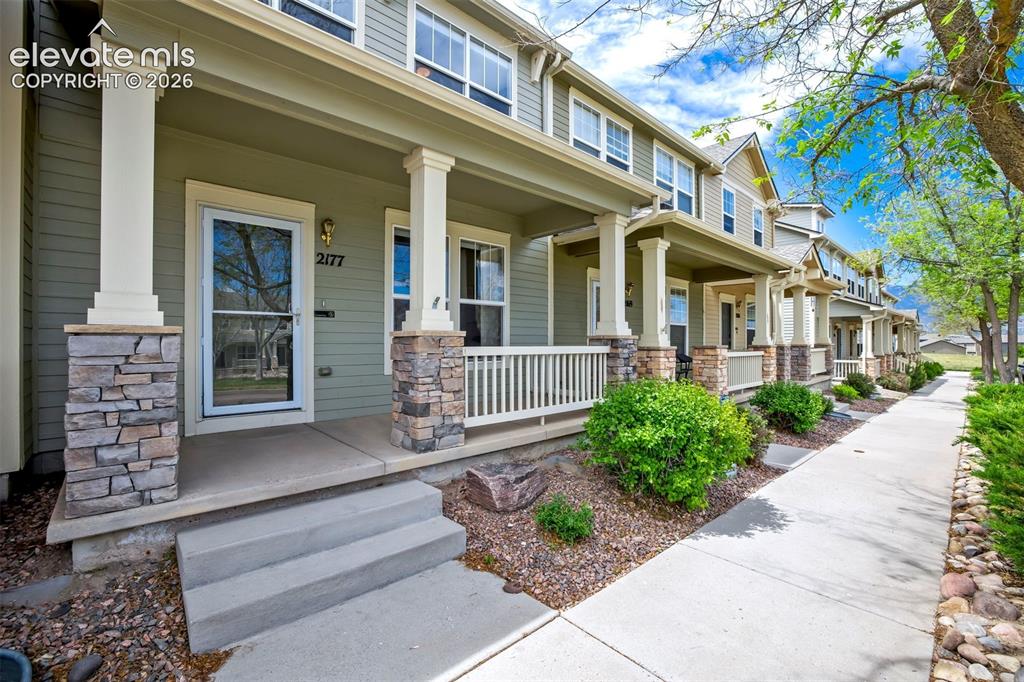 Image 1 of 39: Covered front porch, private & fenced back patio, and a garage. This home h