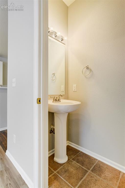 Image 13 of 39: Half bathroom on the main level.