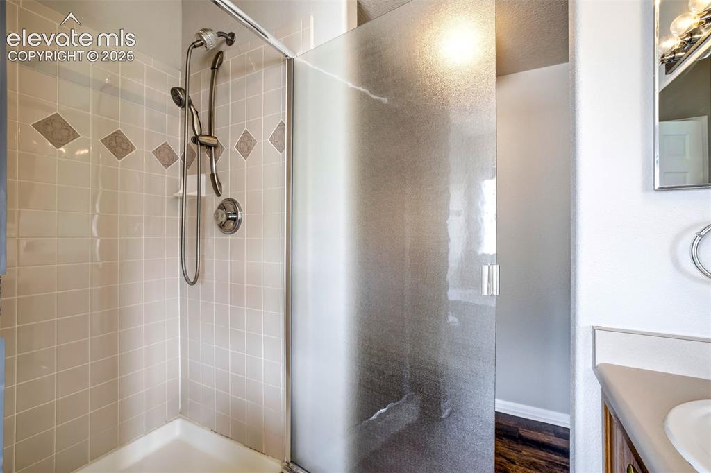 Image 20 of 39: Separate standing shower in the Primary Bathroom. 