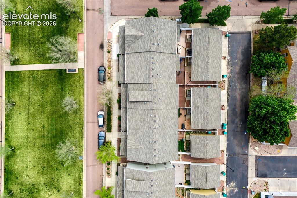 Image 36 of 39: Not many townhomes come with this amount of green space & available parking